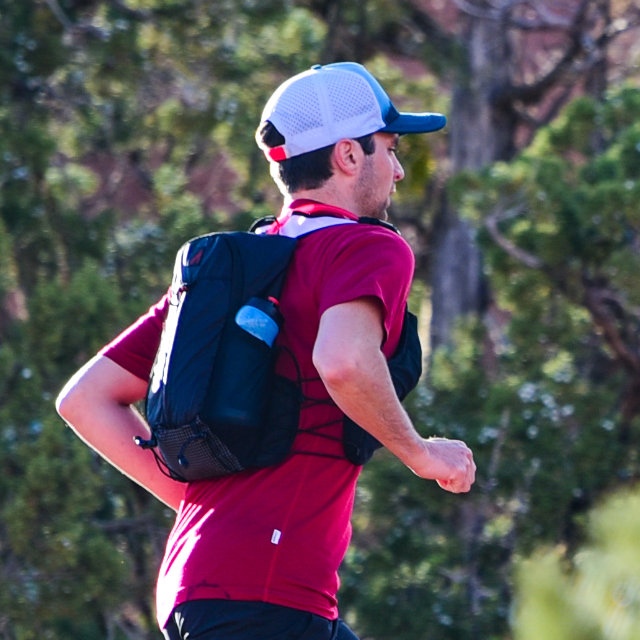 A photo of a runner wearing a Legacy 3.0 Race Vest