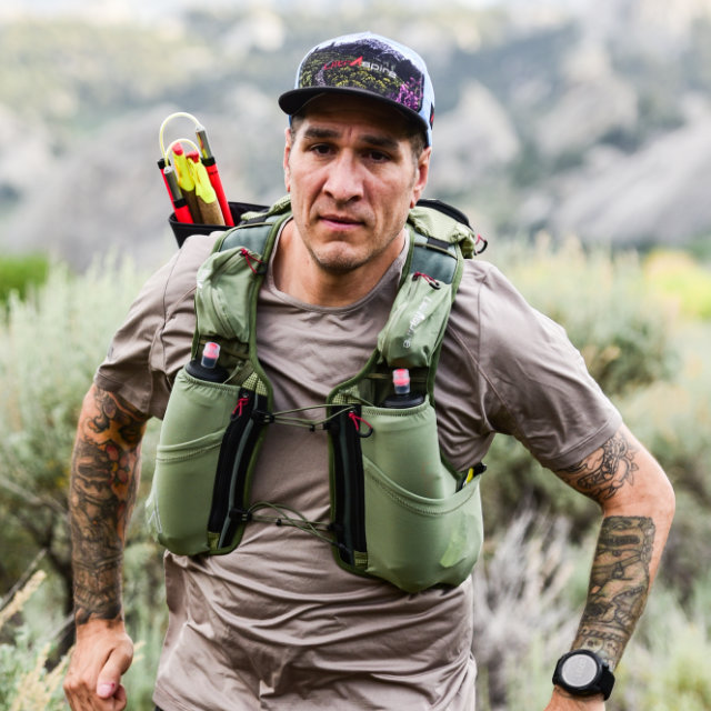 A runner wearing a Traverse Race Vest